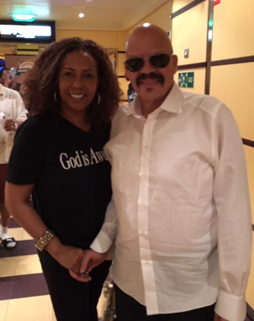With Tom Joyner, speaking on his annual cruise